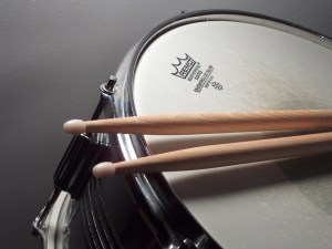 A drum and drumsticks