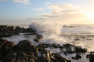 Waves breaking against a rocky shore