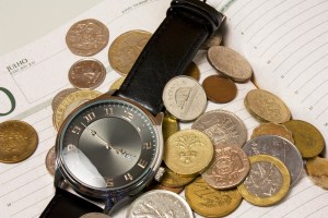 A watch and coins